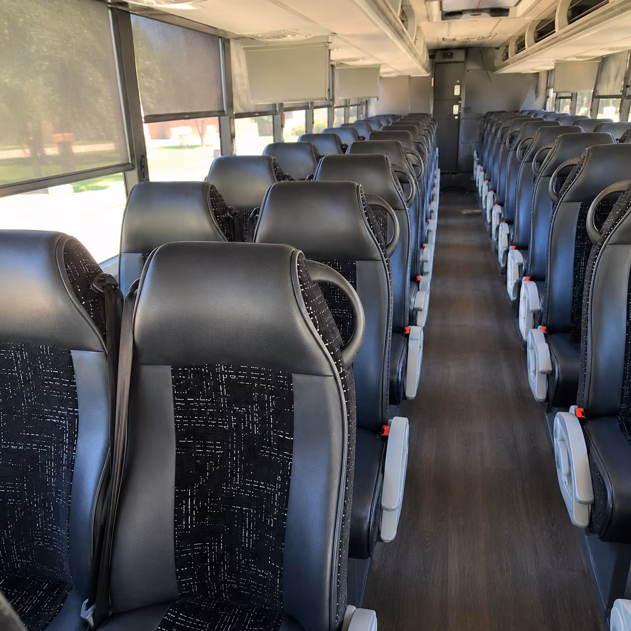 how distance mileage and route complexity affect bus rental costs in downey